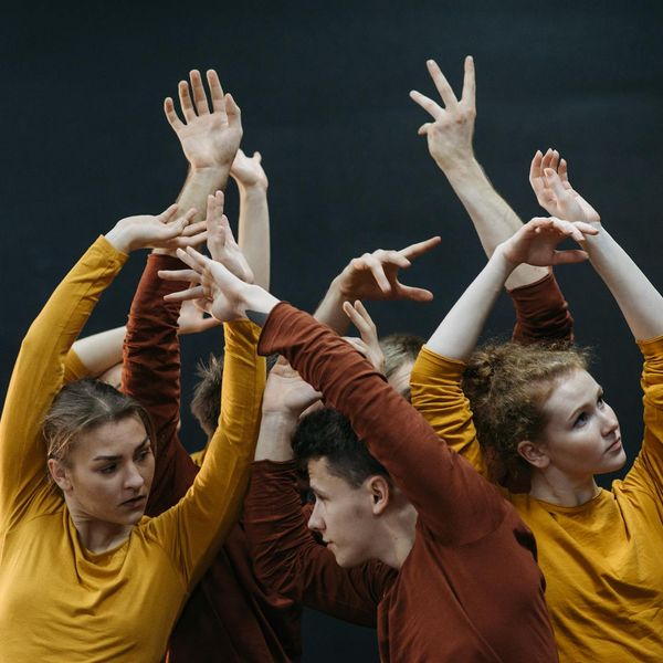 Abstract shot of person performing a rhythmic arm movement.